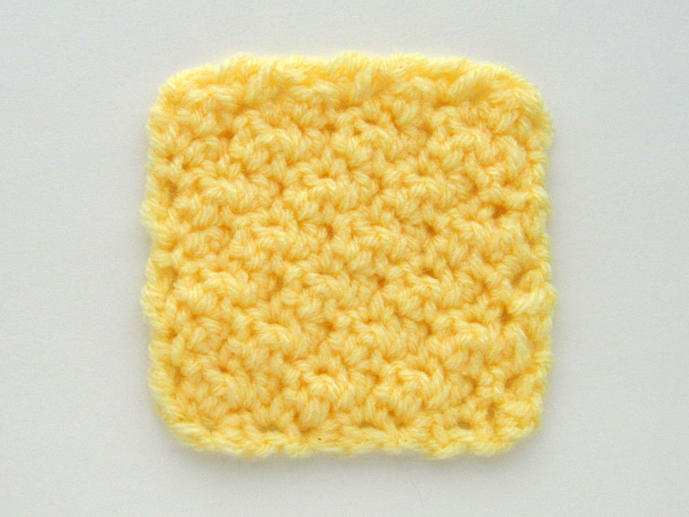 a yellow, c2c lemon peel stitch crochet square